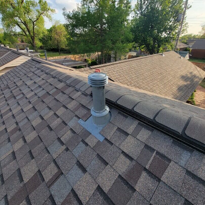 A roof with the top of it being shingles.